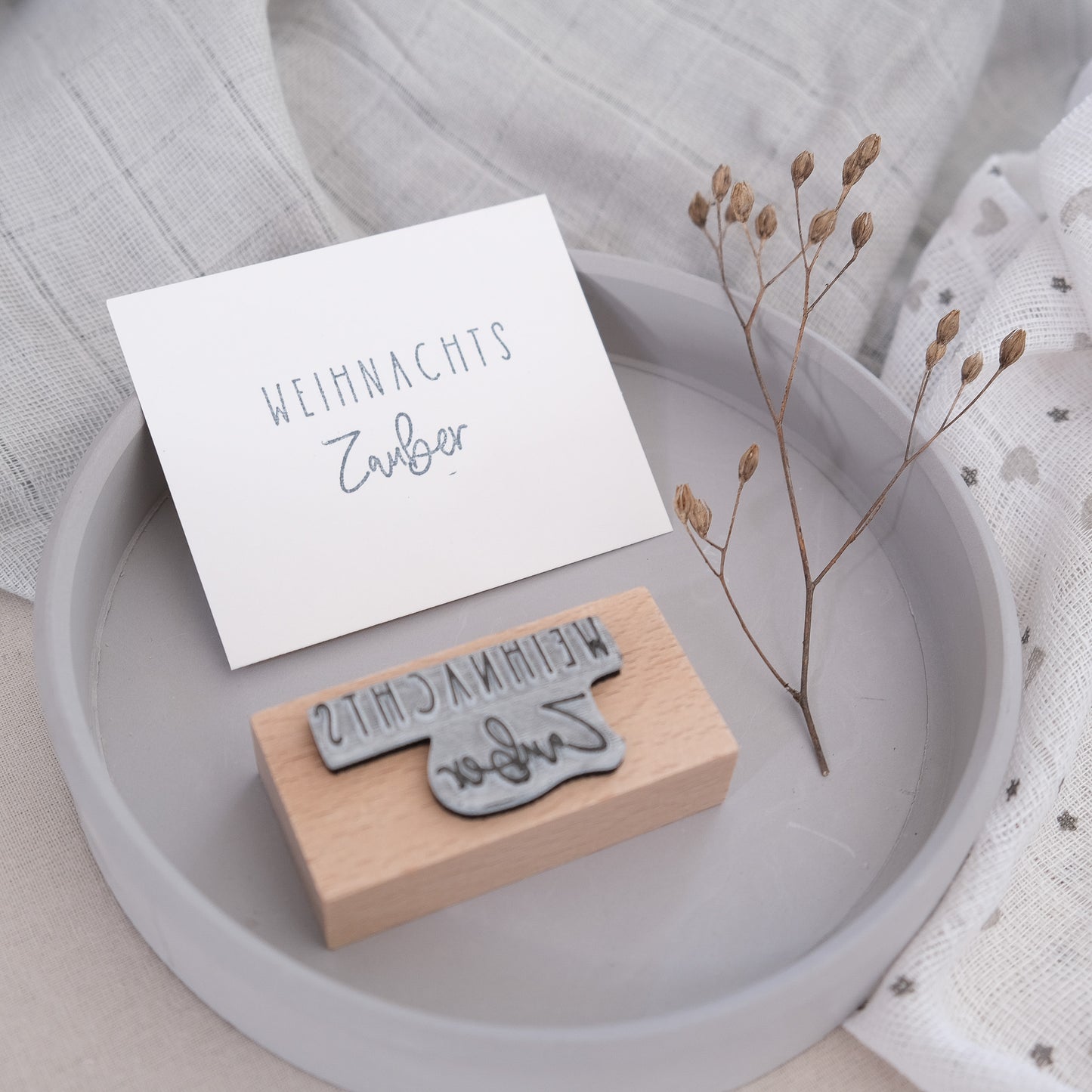 Produktfoto Holzstempel mit Text "Weihnachtszauber" 5 x 5 cm.