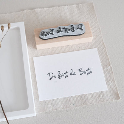 Holzstempel mit Text "Du bist die Beste"