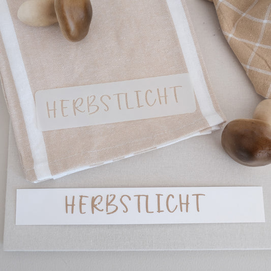 Schablone mit Schrift Herbstlicht.